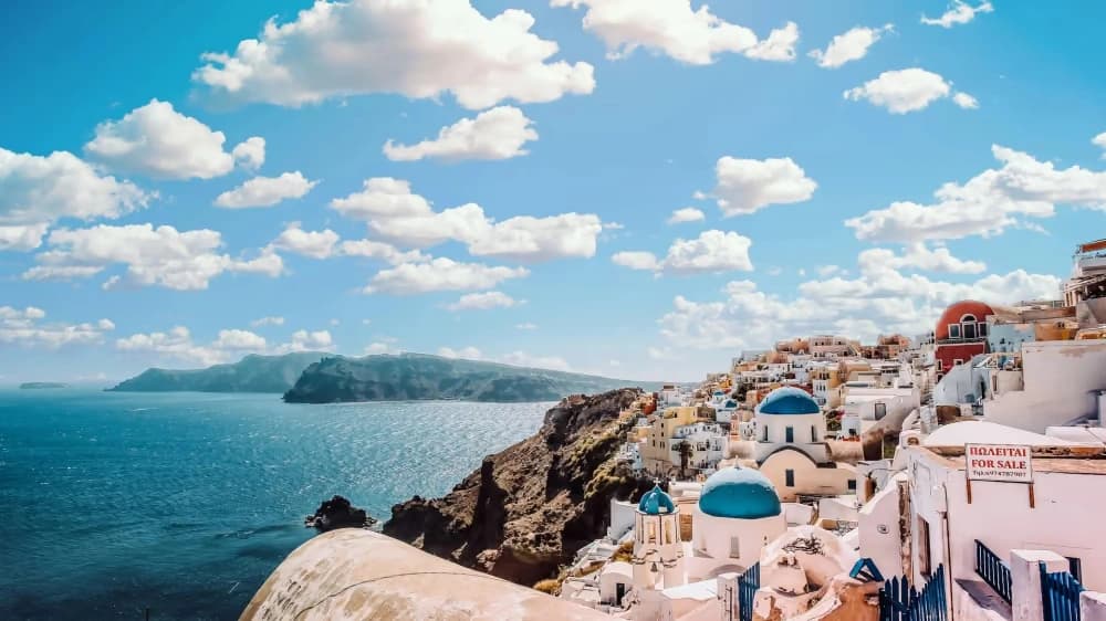 Whitewashed buildings overlooking the sea in Greece