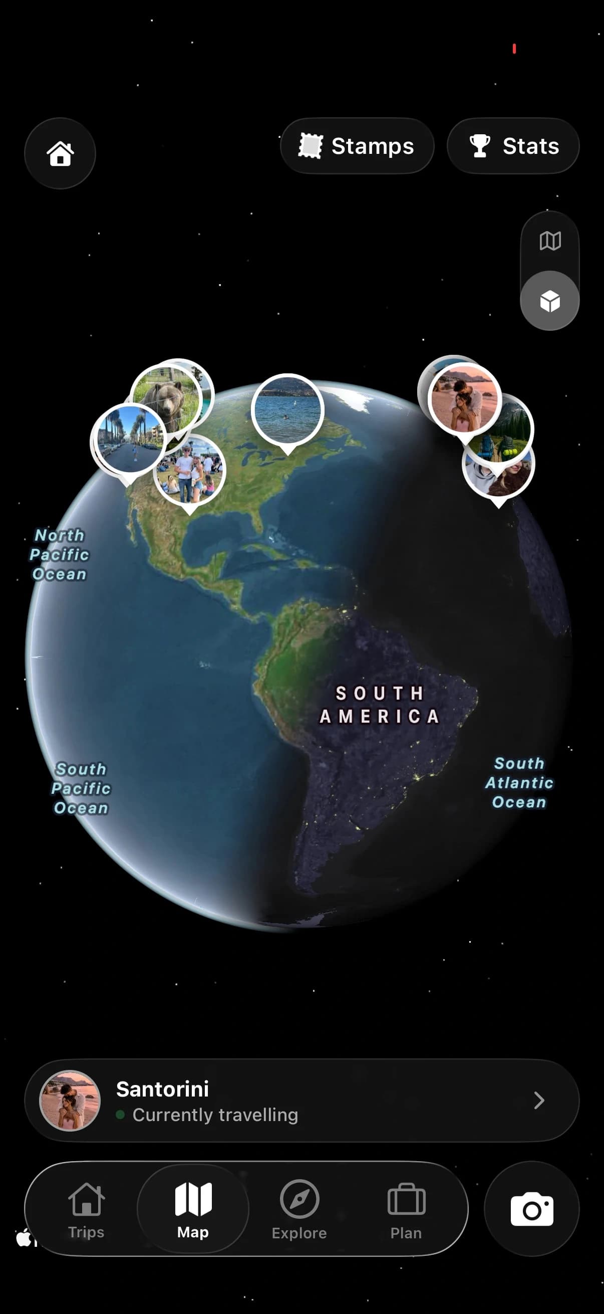 TripMemo travel globe with photo memories pinned across North America