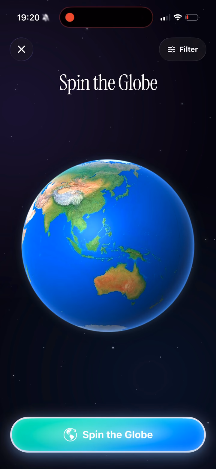 Spin the Globe in the TripMemo app on iPhone, showing a 3D Earth ready to spin