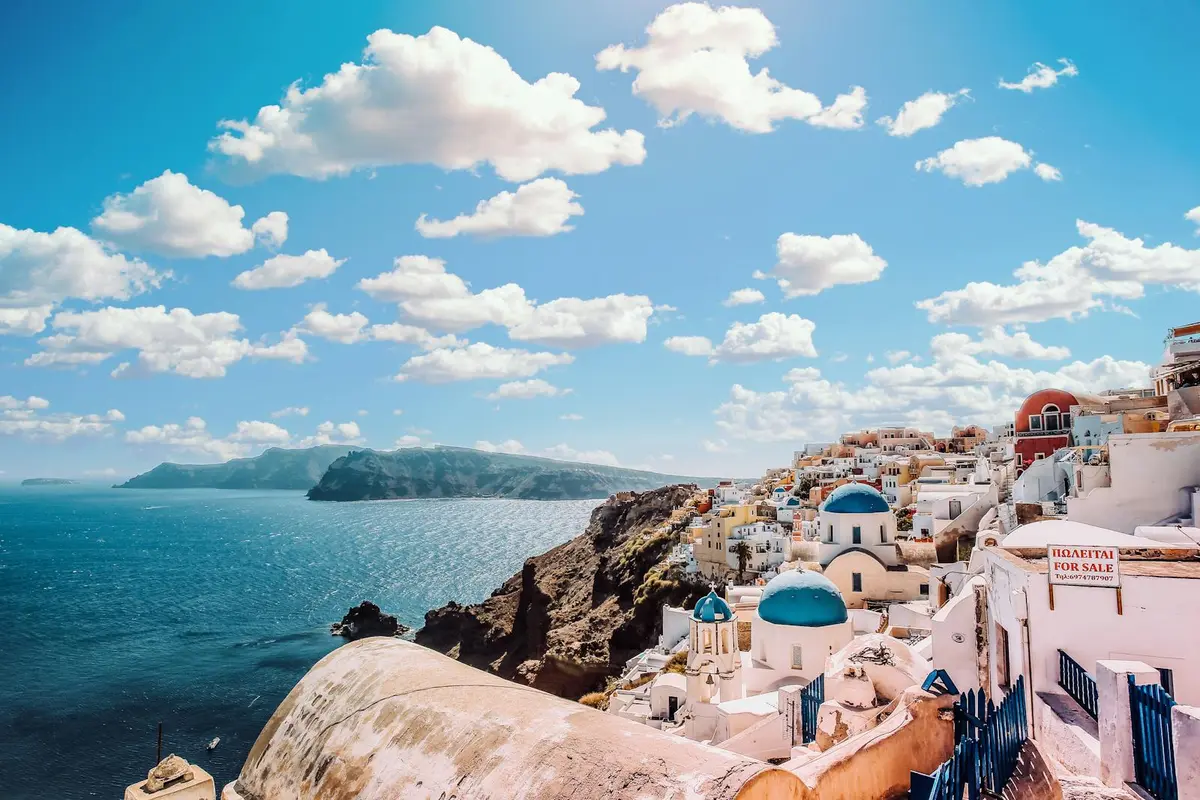 Santorini coast captured as a travel photo stamp