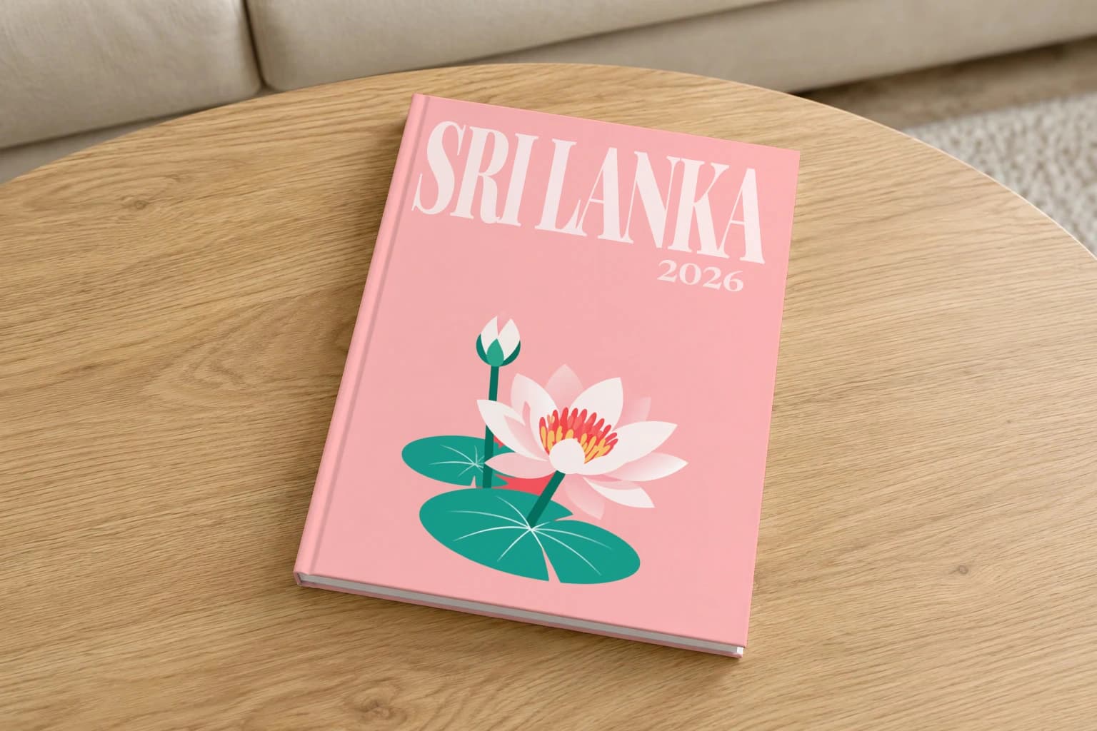 Sri Lanka hardcover photo book with the illustrated cover of the lotus, on a round oak coffee table in a bright living room