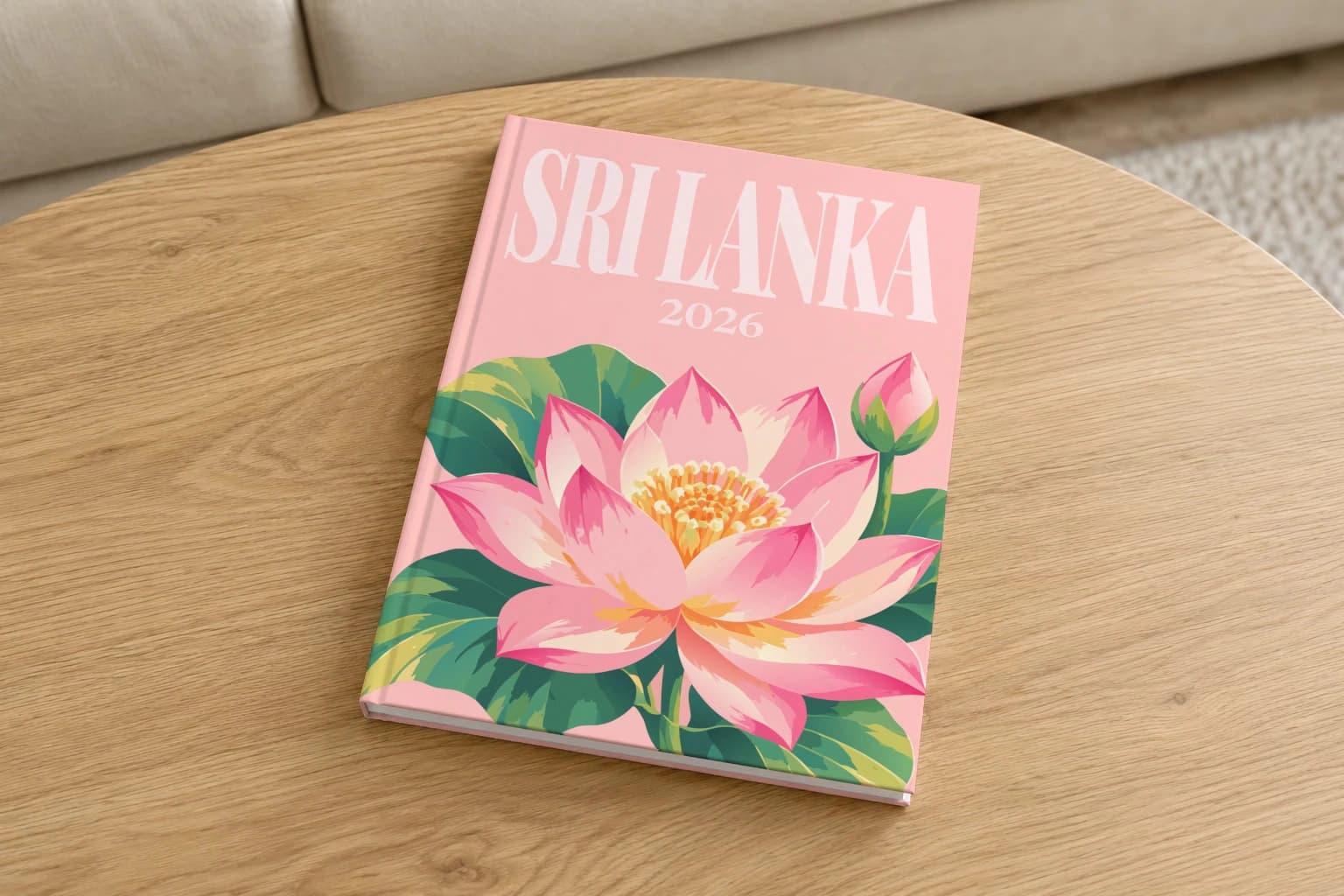 Sri Lanka hardcover photo book with the illustrated cover of the lotus, on a round oak coffee table in a bright living room