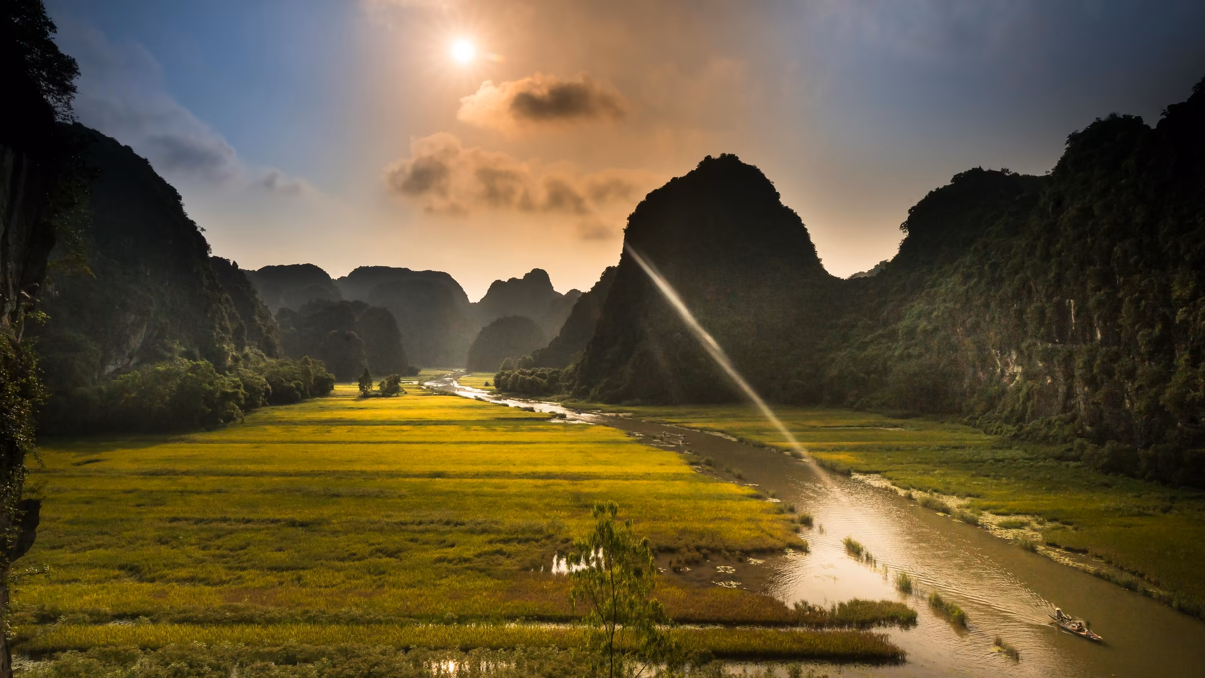 A misty green valley and river in Vietnam