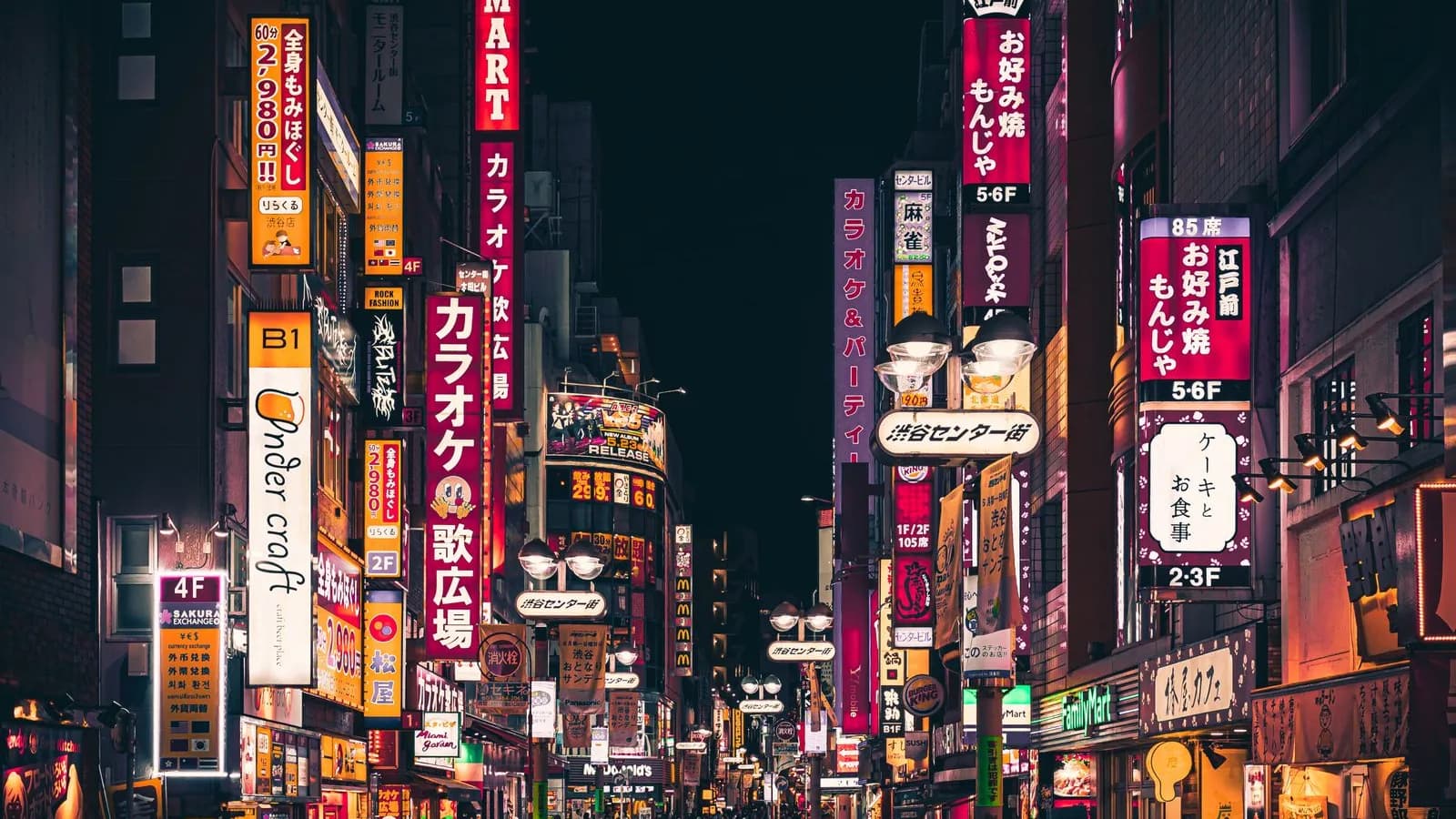 Colourful Tokyo street at night illustrating a digital nomad travel plan