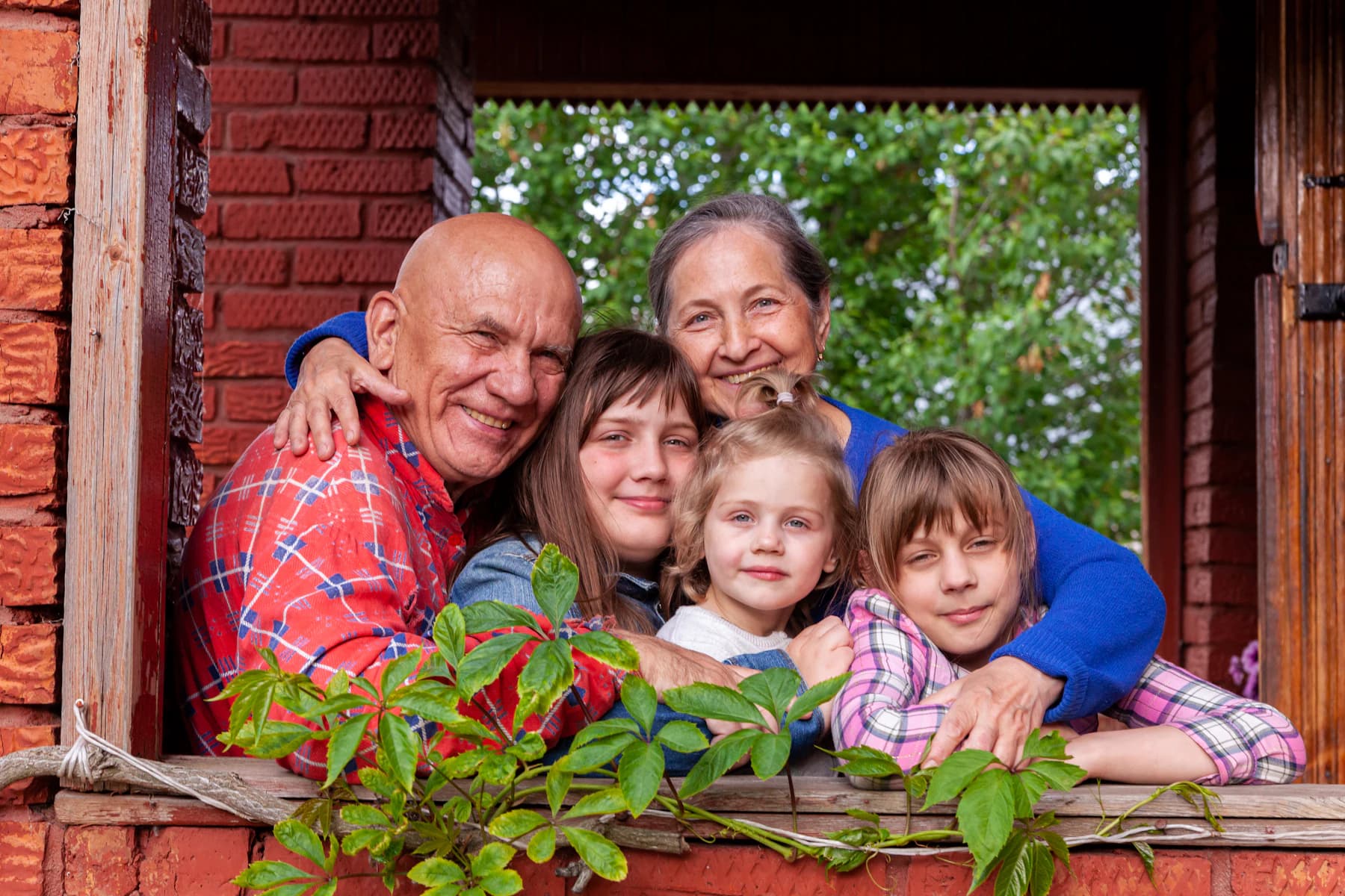 Grandparents, parents and children together on a family trip