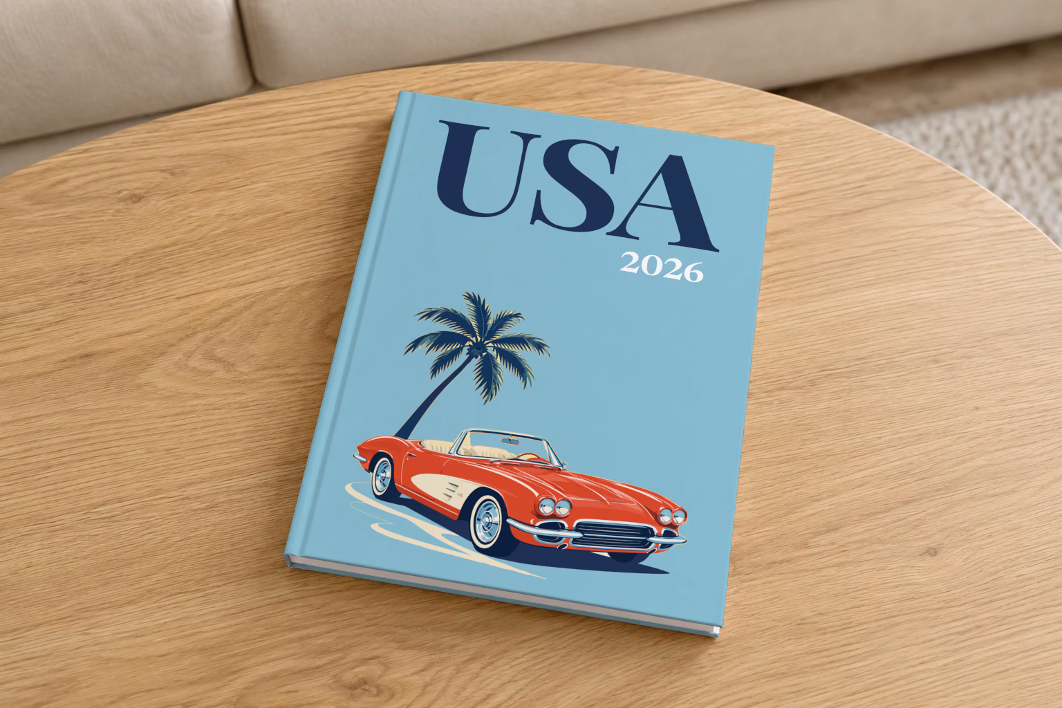 Florida hardcover photo book with the USA illustrated cover of a red Corvette and a palm tree on dusty blue, on a round oak coffee table in a bright living room