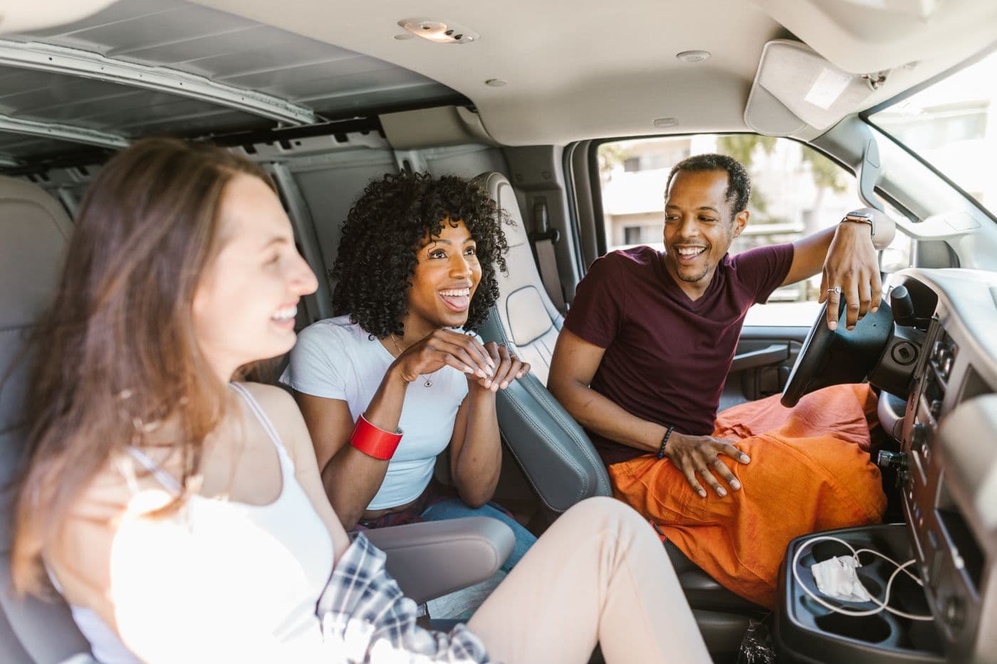 Friends sharing a road trip together