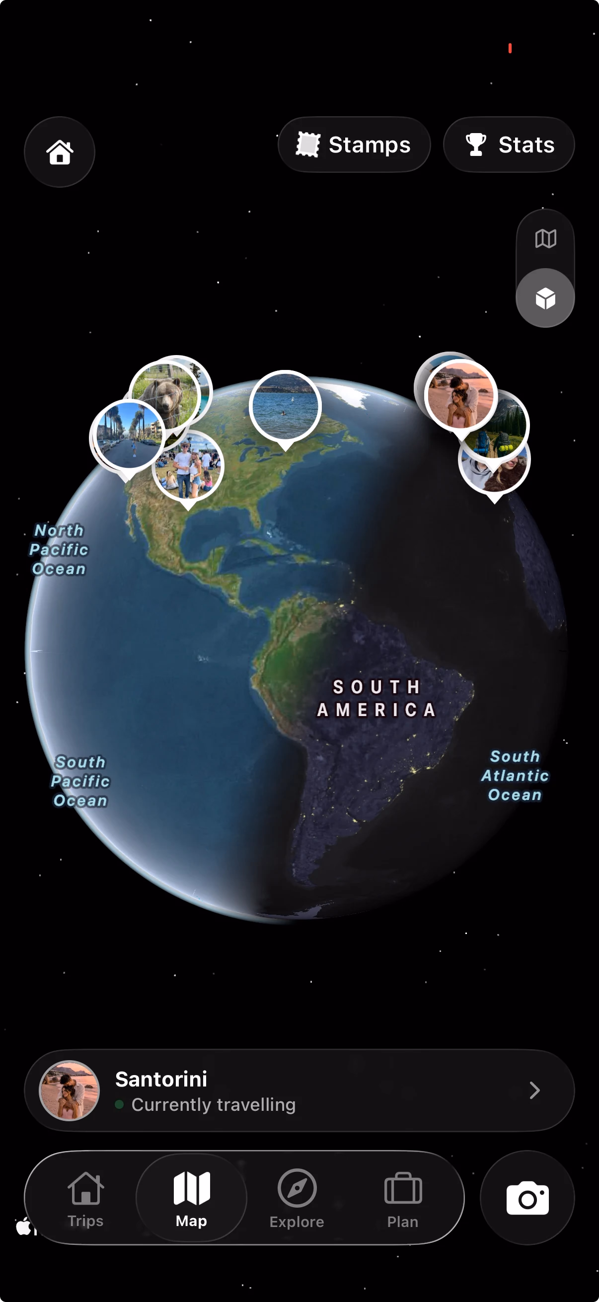 TripMemo travel globe with photo memories pinned across North America