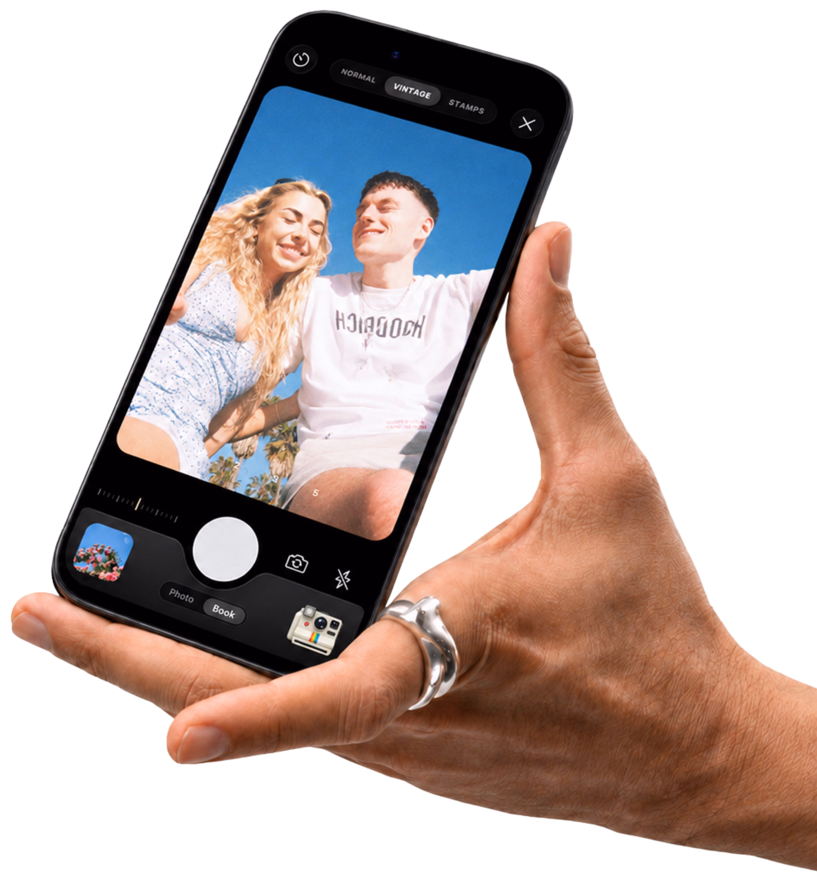 Hand holding an iPhone displaying a TripMemo travel book